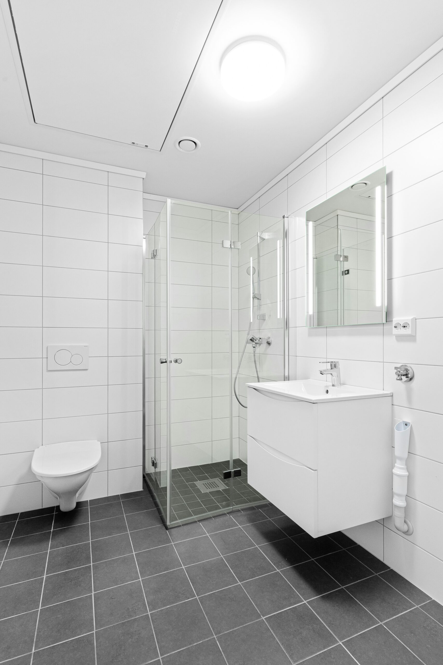A compact bathroom transformed by thoughtful design and expert renovation.