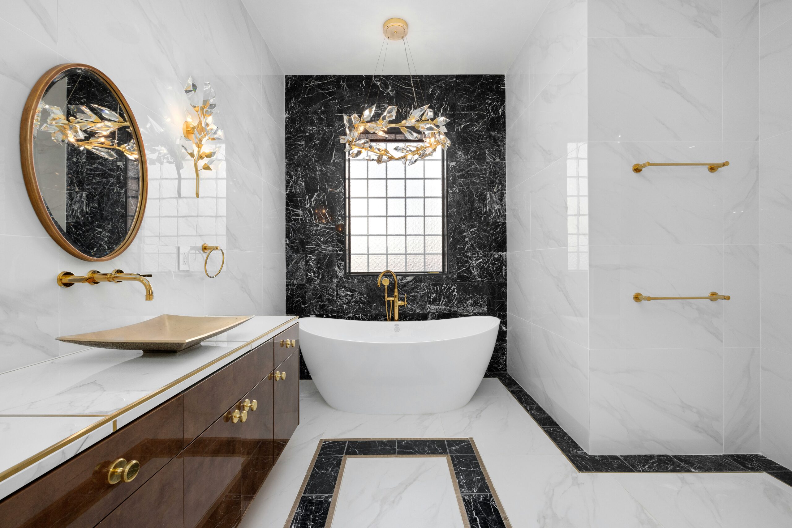 A high-end rebath experience with indulgent textures and finishes.