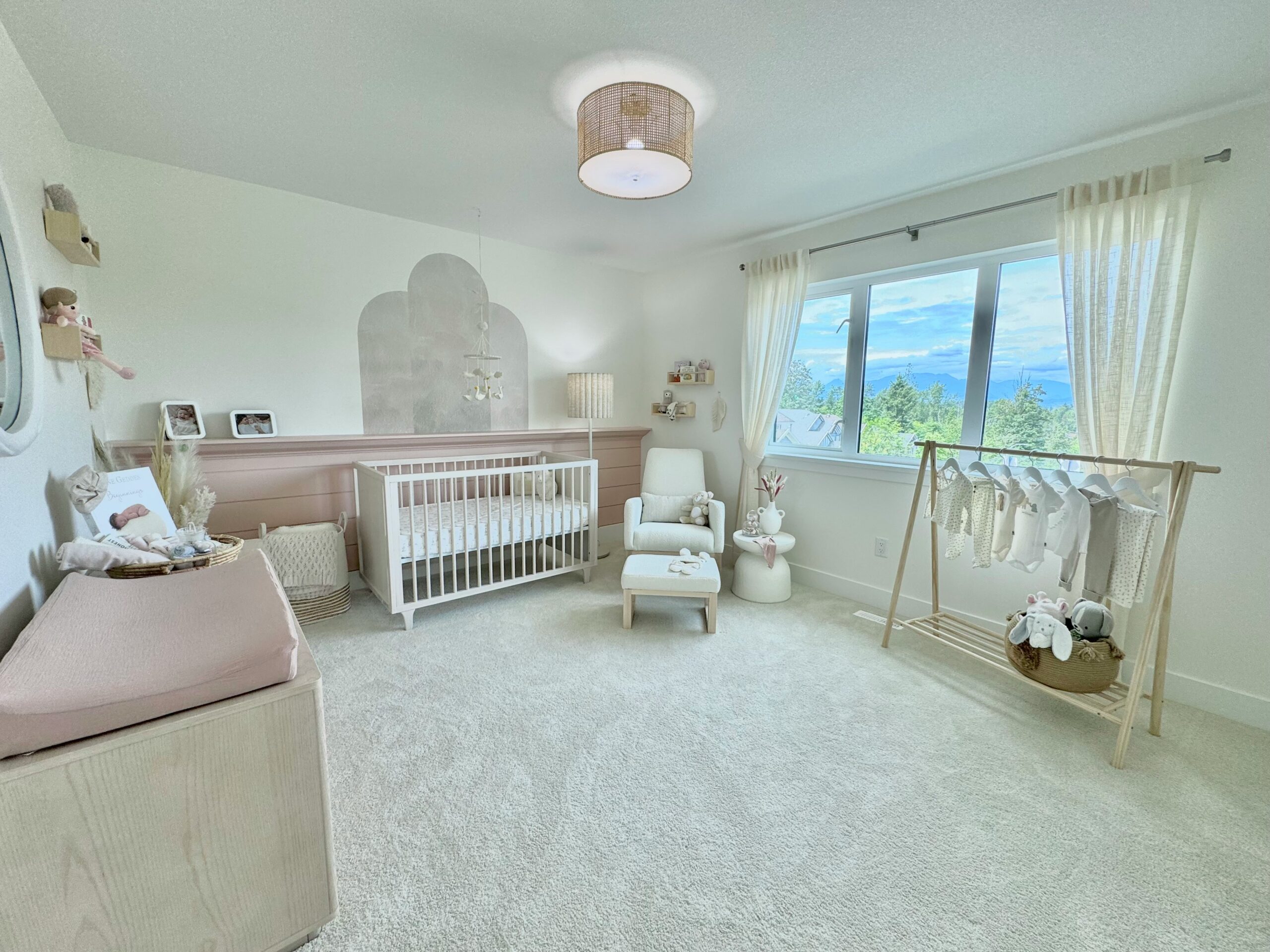Whimsical baby room makeover with soft carpet replacement and pastel wall paint — a cozy home customization.